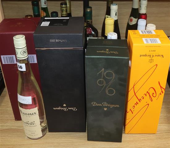 Twenty five assorted bottles of wine and spirits including Tokaji 1993 and four empty Champagne boxes